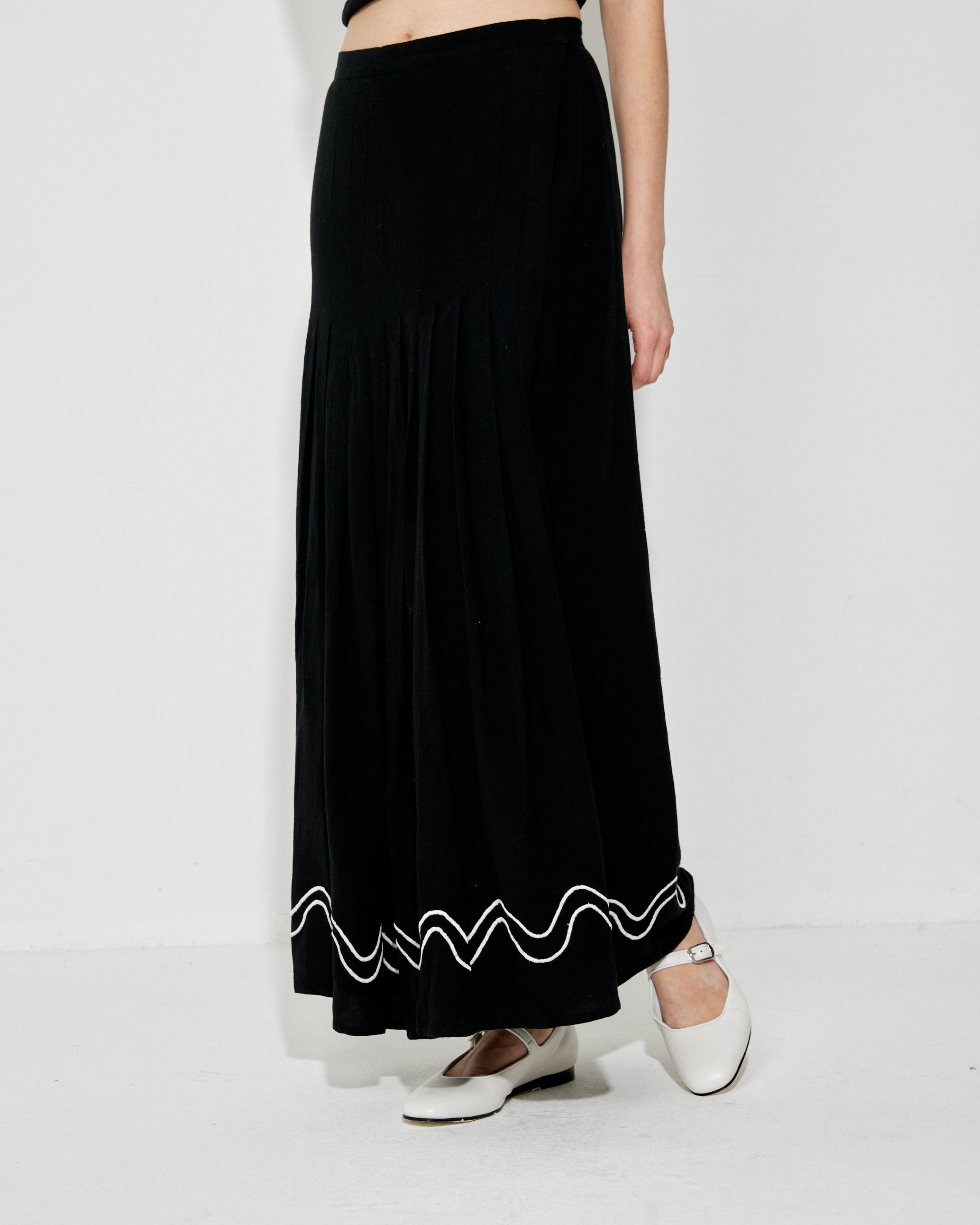 The Flora Pleated Skirt in Black